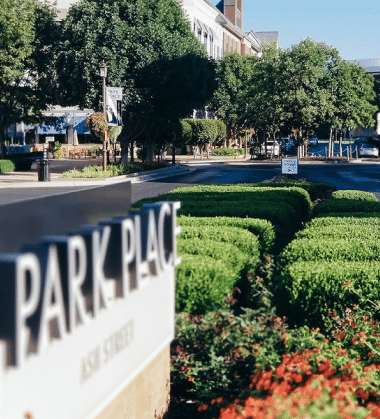 a park place sign in front of a building.