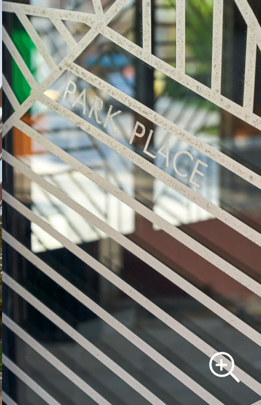 a glass door with a sign that says park place.